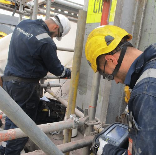 Ultrasonic Testing (UT) being performed by Sonomatic RAIS Rope Access and Inspection Services Technicians on site at a refinery